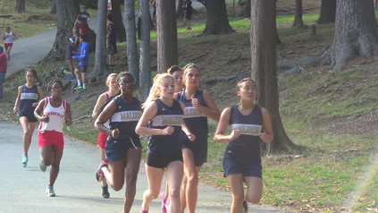 Left to right: Juniors Deborah Kibazo, Gillian Willcox, seniors Victoria Hannafin, and Helen Chin at the meet against Somerville.