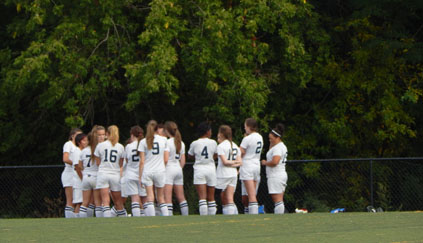 The girls team discussing together.