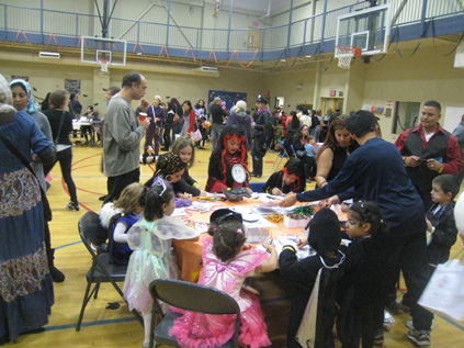 Children at the crafts table. Photo by Jasper Haag