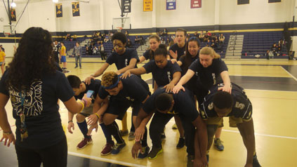 The seniors practicing their pyramid.