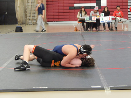 Ahern taking down his opponent.