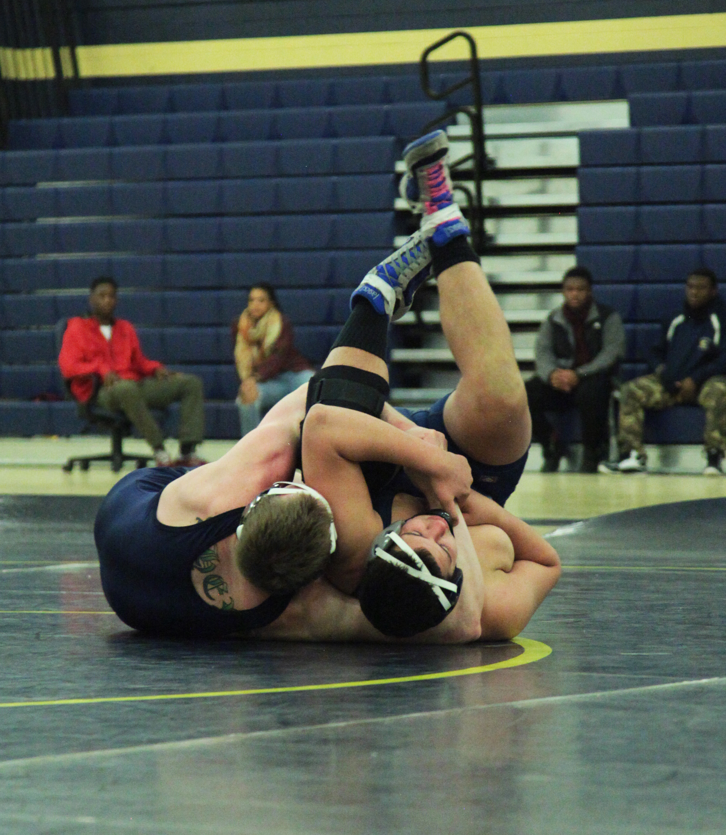 Senior Shaun Ahern pinning down his opponent.