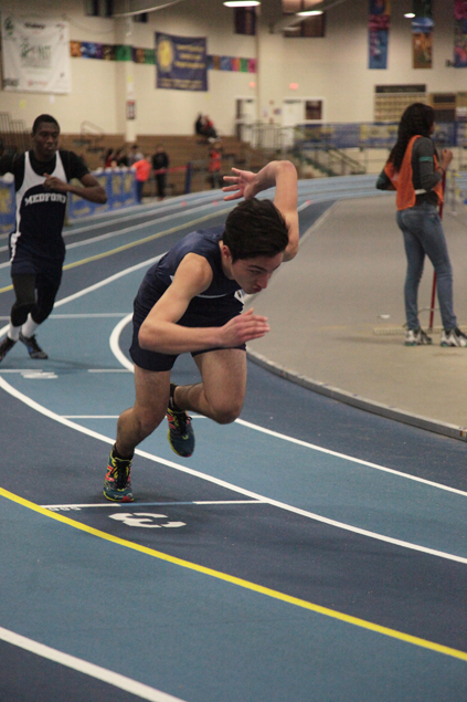 Sophomore Hamza Rizancevic sprints ahead Medford competitor in the 300 meter race. 