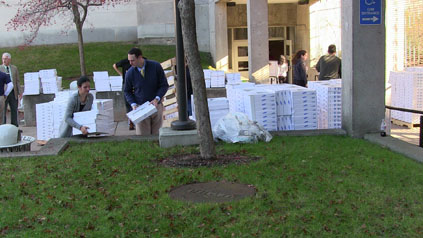 Faculty and students unloading chromebooks at Malden High School. 