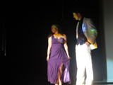 Seniors Olivia Verdone and Nick Hames wearing prom wear during the show. 