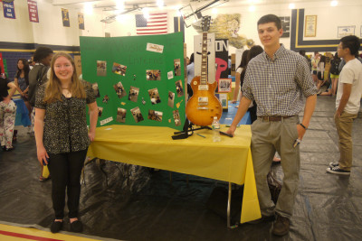 Seniors Angelica Carberry and Nick Hames presenting their poster for their internship. Photo by Tatyanna Cabral.