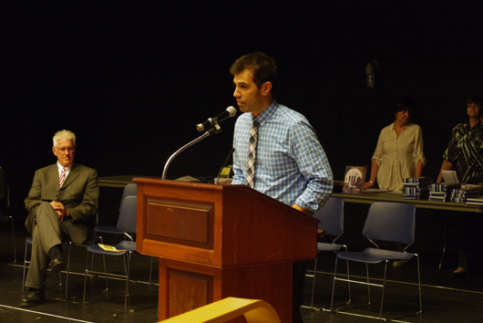 English teacher Sean Walsh presenting an award. Photo by Samuel Martinez. 