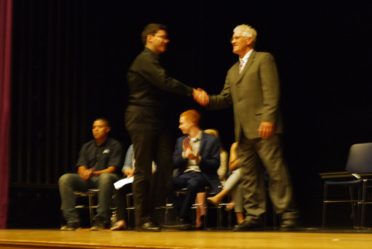 Senior Timur Berilo accepting an award. Photo by Samuel Martinez.