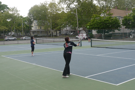 Junior Laura Suarez serving. Photo by Samuel Martinez.