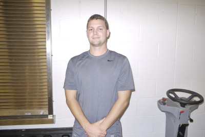 Girls Volleyball coach Dan Jurkowski poses for a picture. Photo by Alexis Brown.
