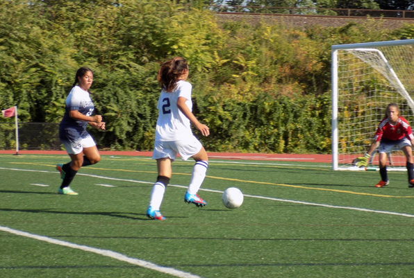 Junior Cleverina Cong makes a dash to the goal. Photo by Liam Elliott.