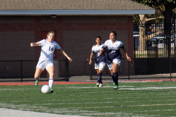 Senior Jacqueline Smith strikes the ball. Photo by Liam Elliott.