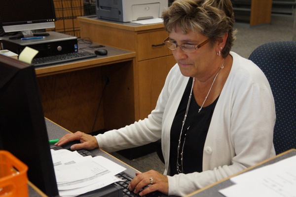 Mary Liberge in the Malden High School Library.