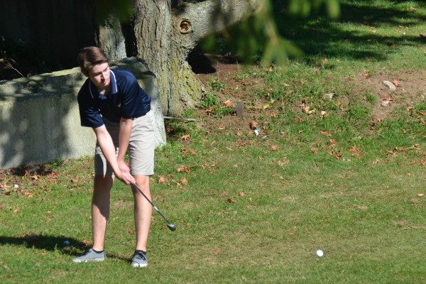 Senior Rory Milan takes a stroke. All photos by Ryan Hames.
