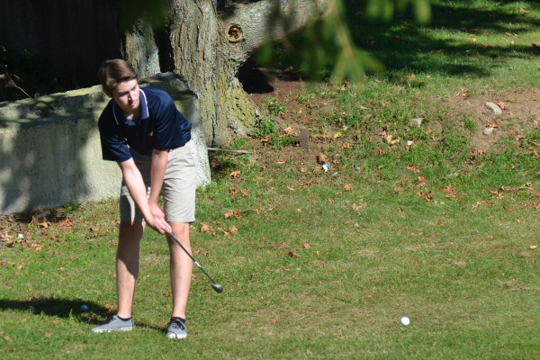 Senior Rory Milan takes a stroke. All photos by Ryan Hames. 