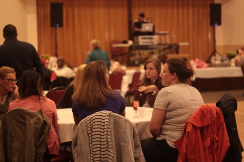 Guests at the fundraiser wait for 