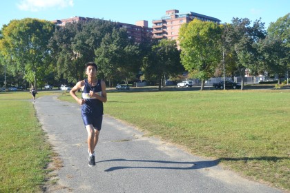 Freshman Jeffrey Song running in the meet against Somerville. Photo by Abhishek Rana.