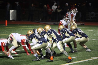 Malden facing off against Everett. Photo by Leila Greige. 