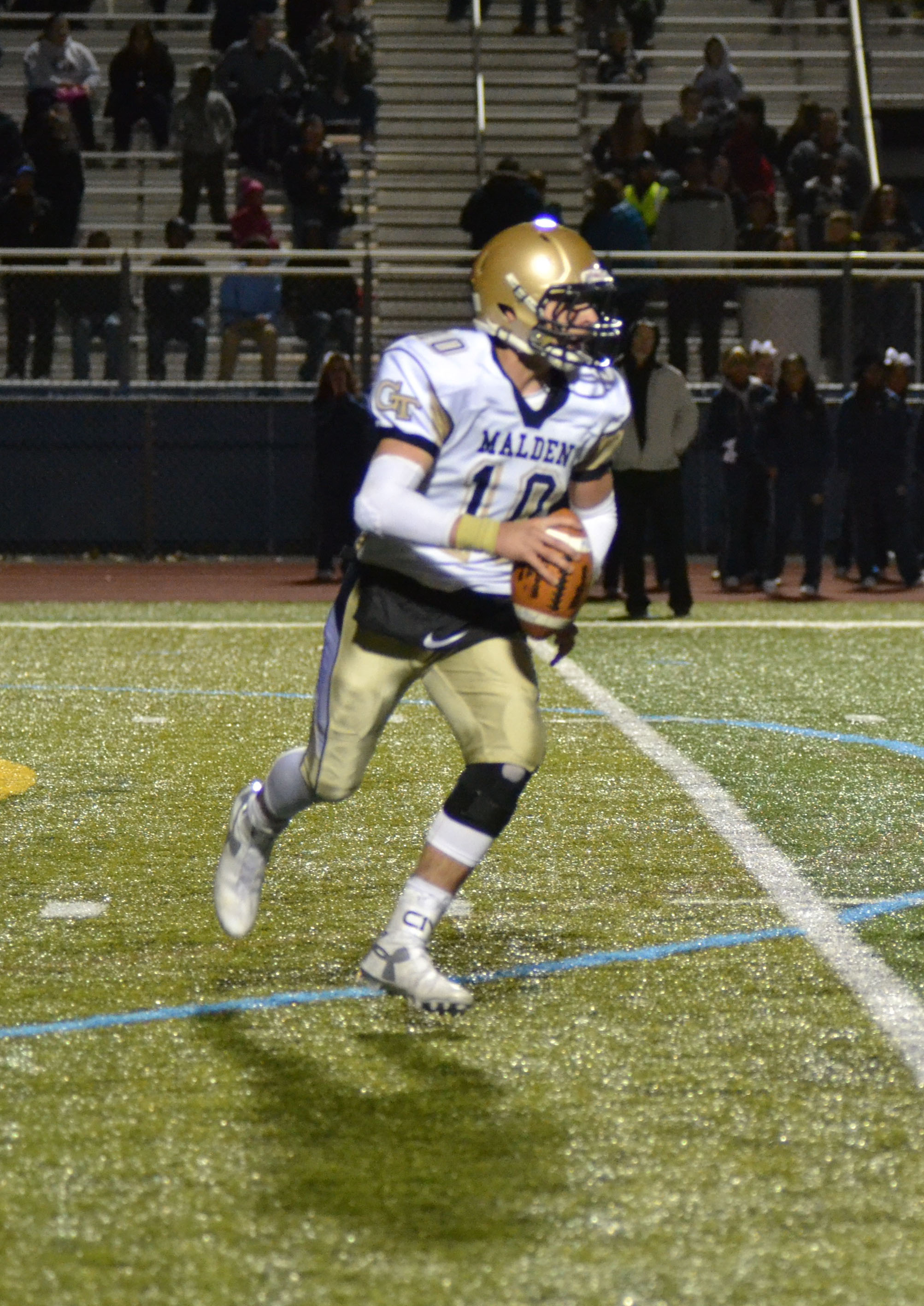 Sophomore QB Jared Martino looks for a receiver. Photo by Ryan Hames.