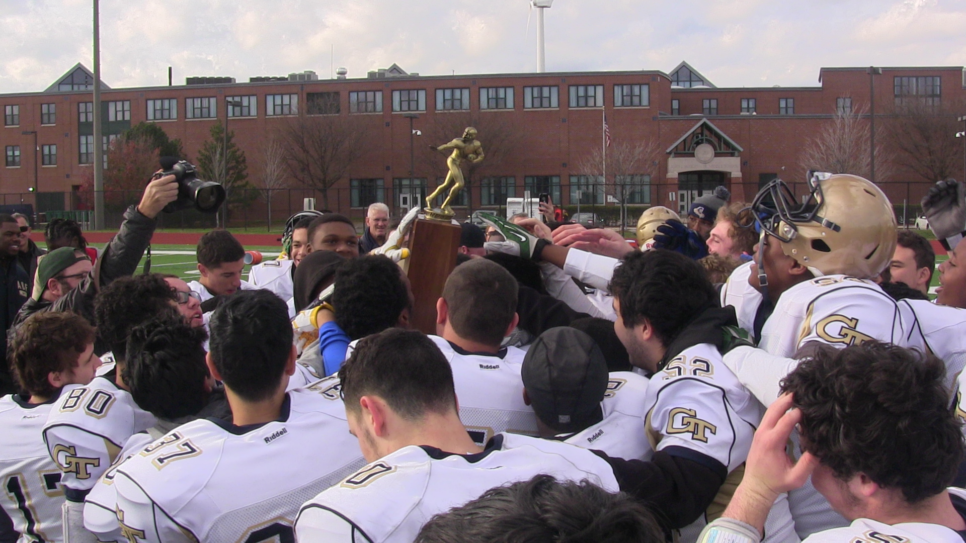 The team holds up the trophy proudly after a 36-59 victory in their favor. Photo by Tenzin Dorjee.