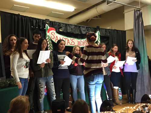 Members of he Malden High School Choral Arts Society performing at the December Family Day. Photo by Ailin Toro.