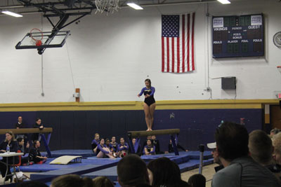 Senior Bianca Alves performs her beam performance. Photo by Tatyanna Cabral. 