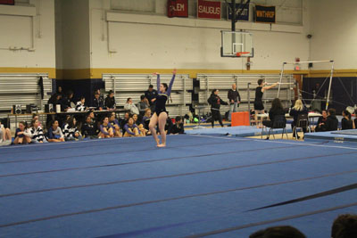 Senior Irma Kurtagic performing her floor routine. Photo by Tatyanna Cabral. 