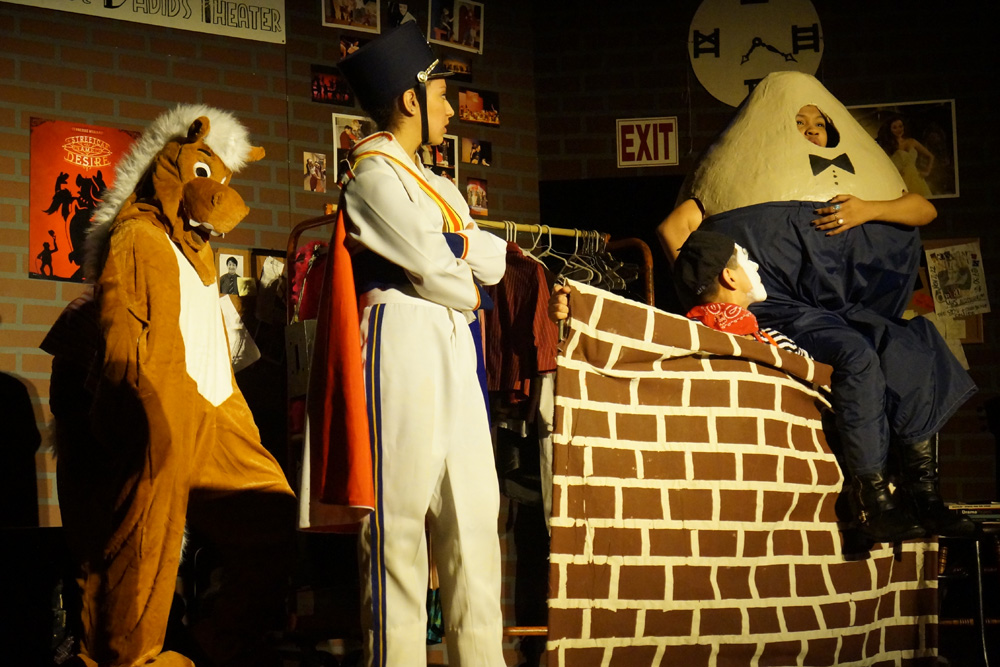 The cast acting out a scene from Humpty Dumpty. Photo by Meghan Yip.