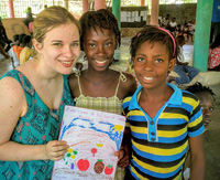 ESL teacher Jessica Haralson with students at the Matènwa Community Learning Center in Haiti. Photo submitted by Paul Degenkolb. 