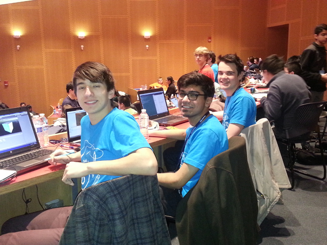 From left to right, Ricky Cordero, Mohsin Qureshi, and Jasper Haag are pictured at the Hackathon. Photo provided by Paul Marques. 