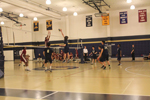 The Malden boys volleyball team facing off against Lowell. Photo by Ana Kerr. 