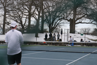 Senior Edward Gu serving the ball. Photo by Ailin Toro. 