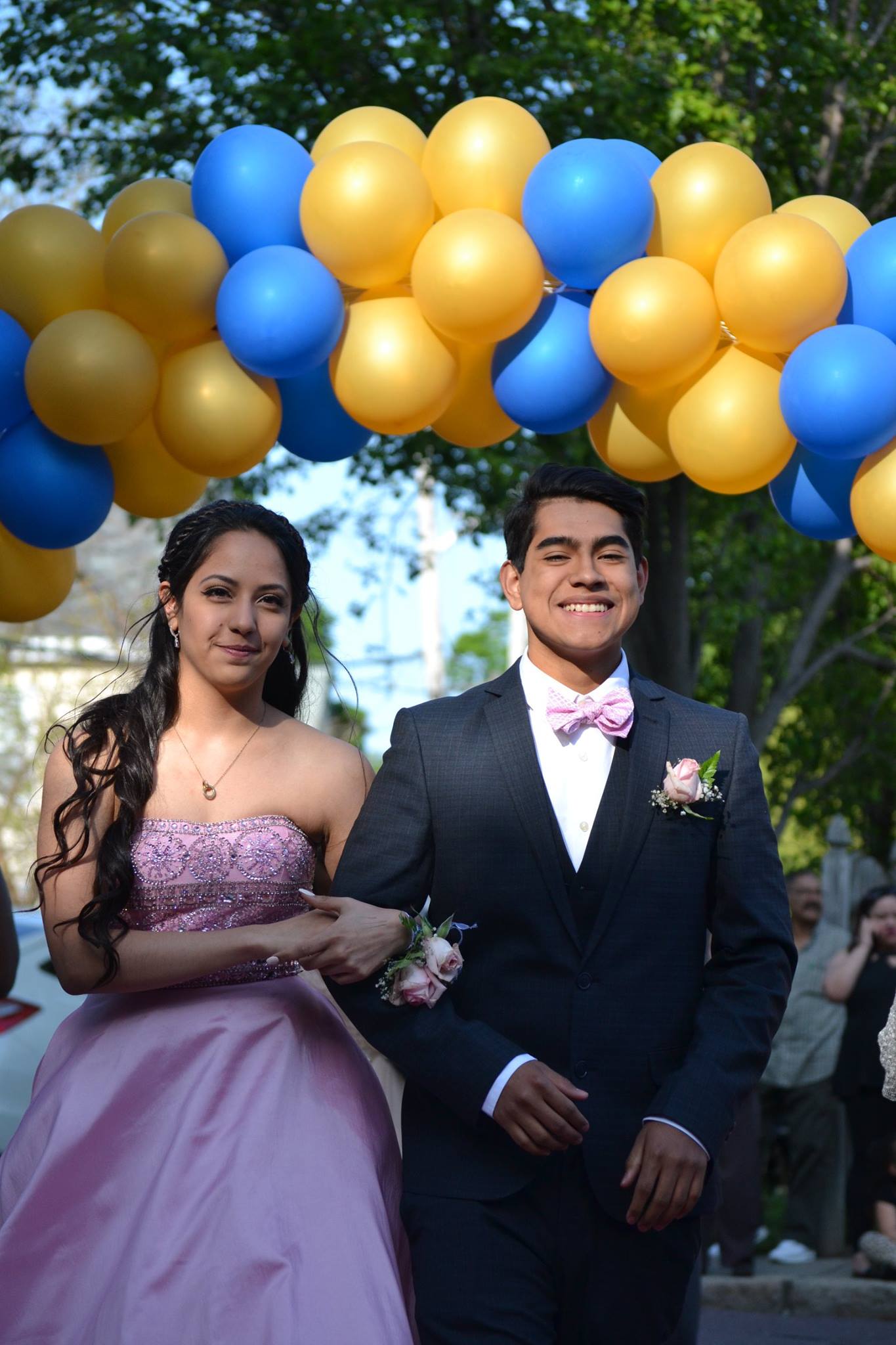 Seniors Kamila Regalado and Brayan Angula walking down the red carpet. Photo taken by Jesaias Benitez.