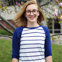 Secretary Tori MacDonald posing for a picture. Photo by Meghan Yip. 