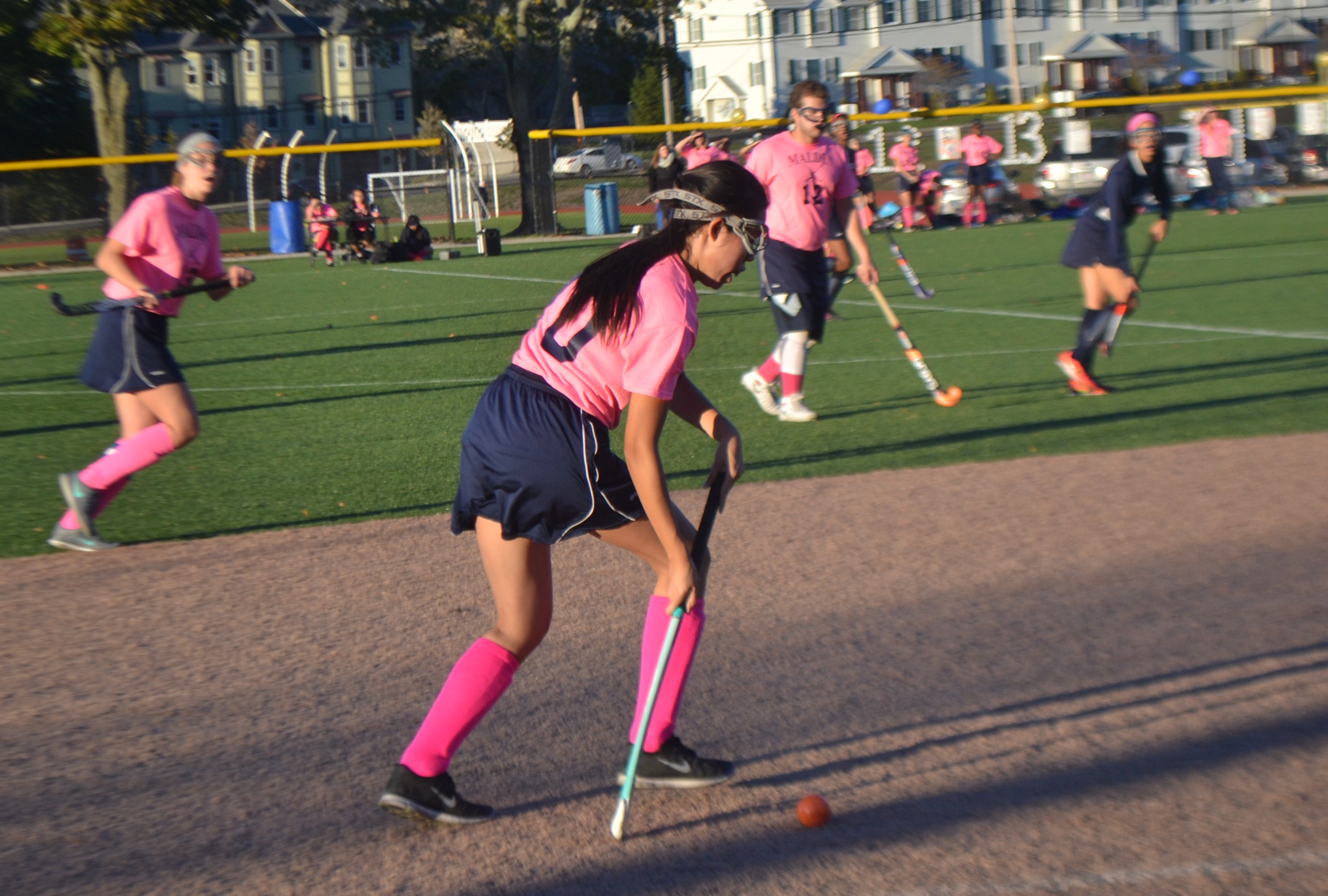 Junior Audrey Goon bringing the ball up the field. Photo taken by Abhishek Rana. 