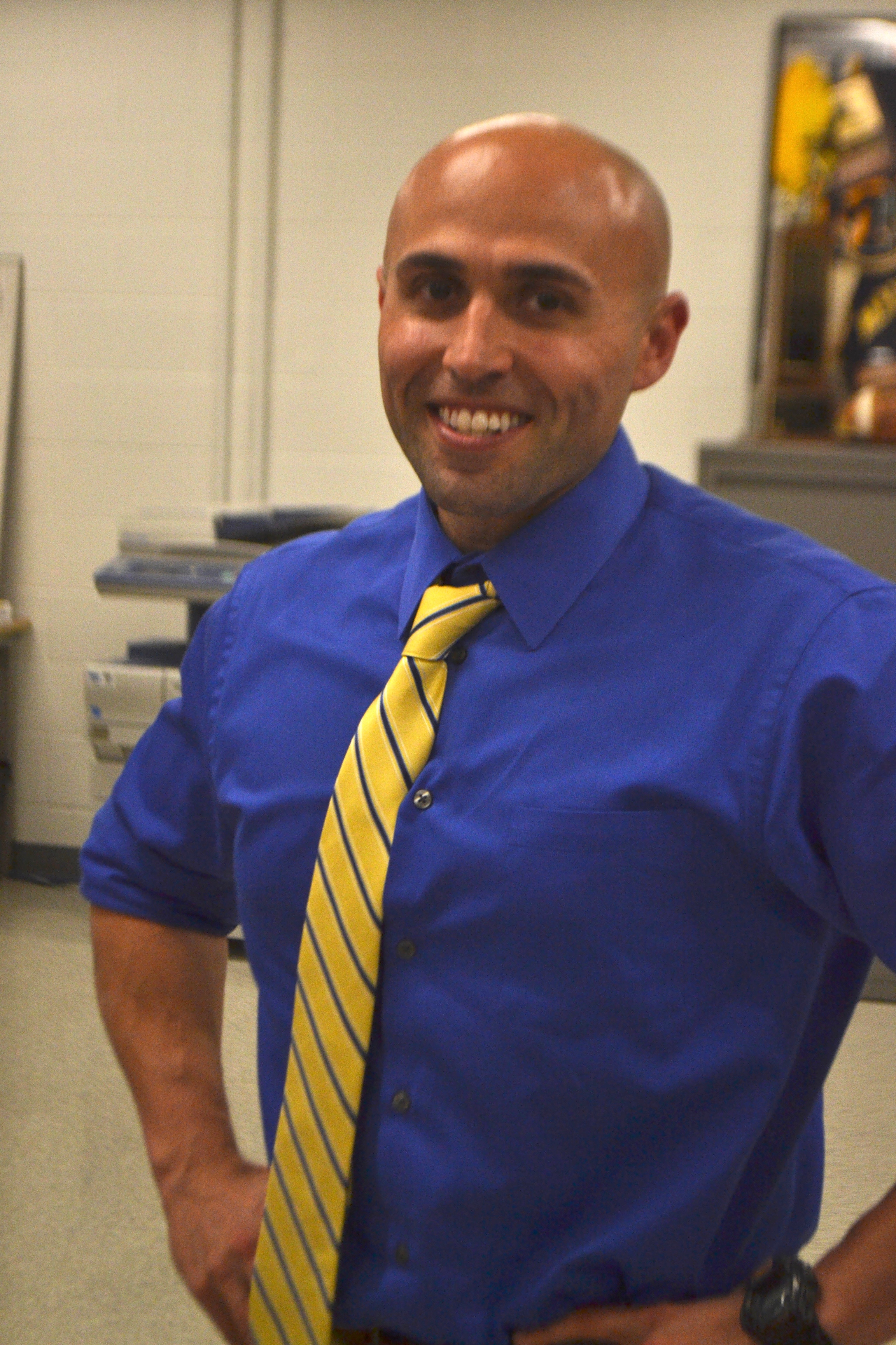 New athletic director, Charlie Conefrey posing for a photo. Photo taken by Ryan Hames. 