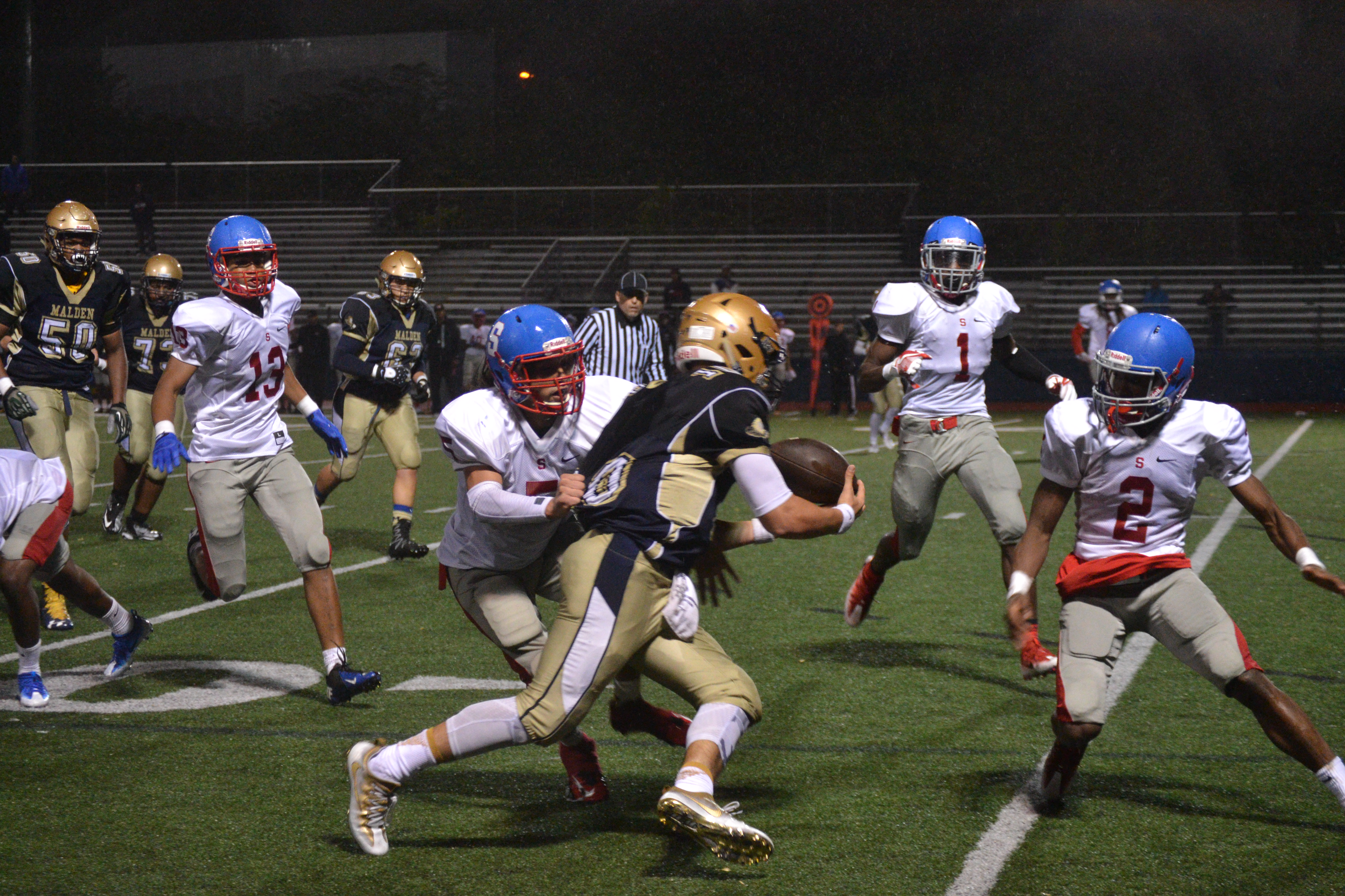 Junior Jared Martino running the ball. Photo by Abhishek Rana.