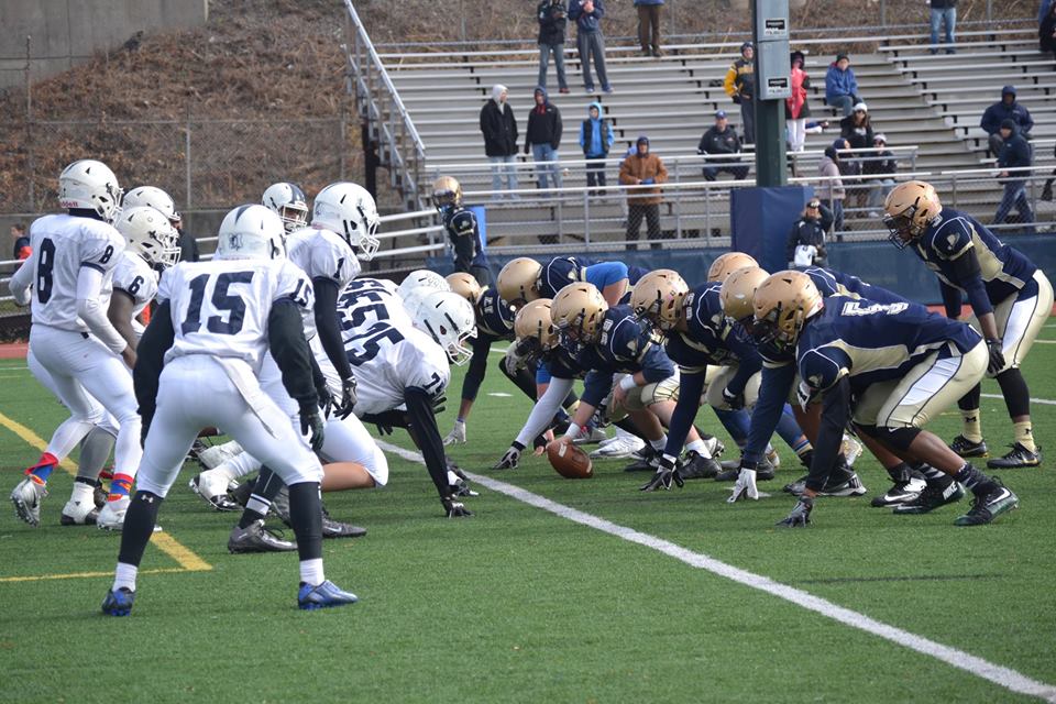 Malden offense lining up for the snap. Photo taken by Abhishek Rana. 