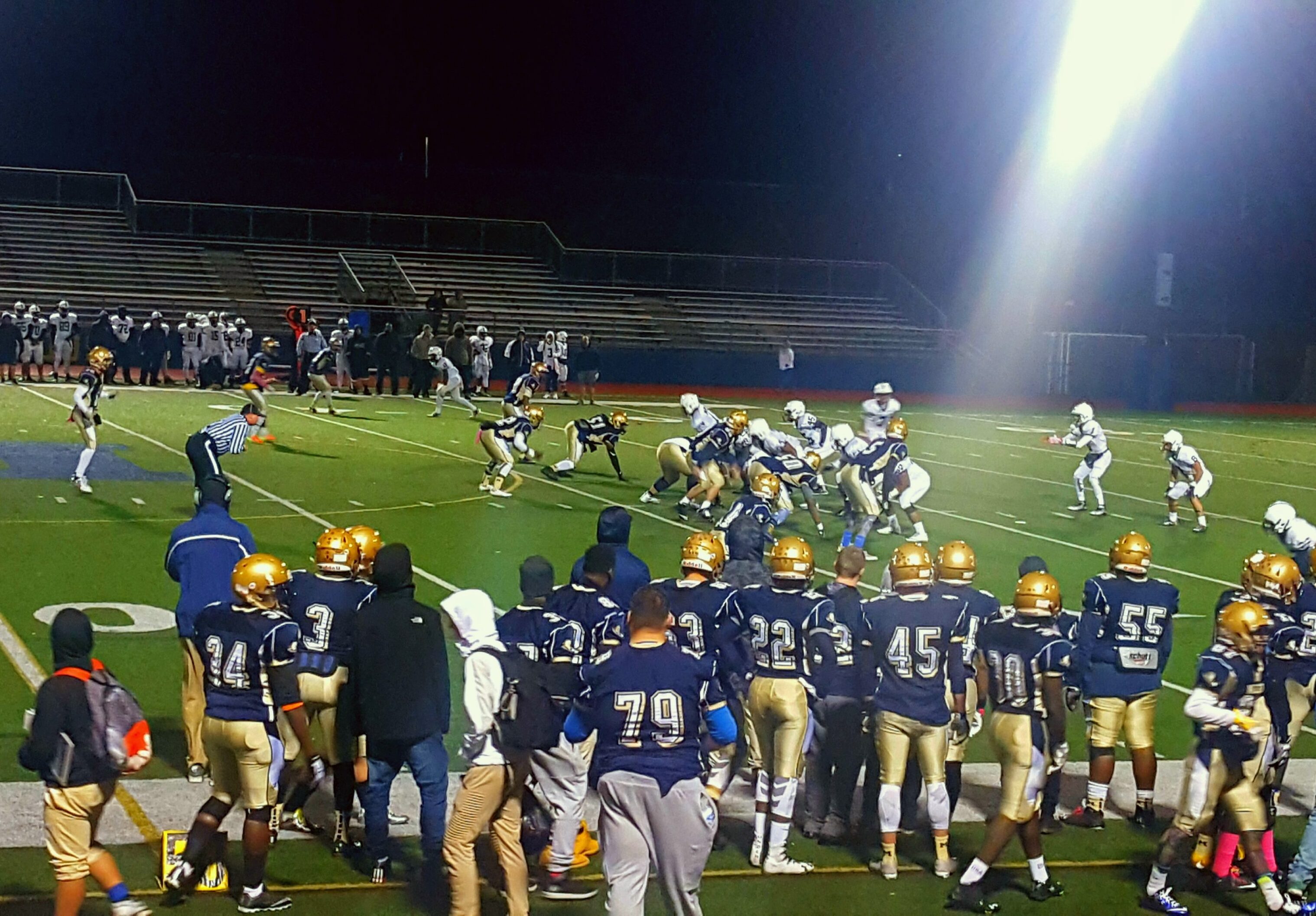 MHS defense preparing to stop the Lawrence High School offense. Photo by Tenzin Dorjee