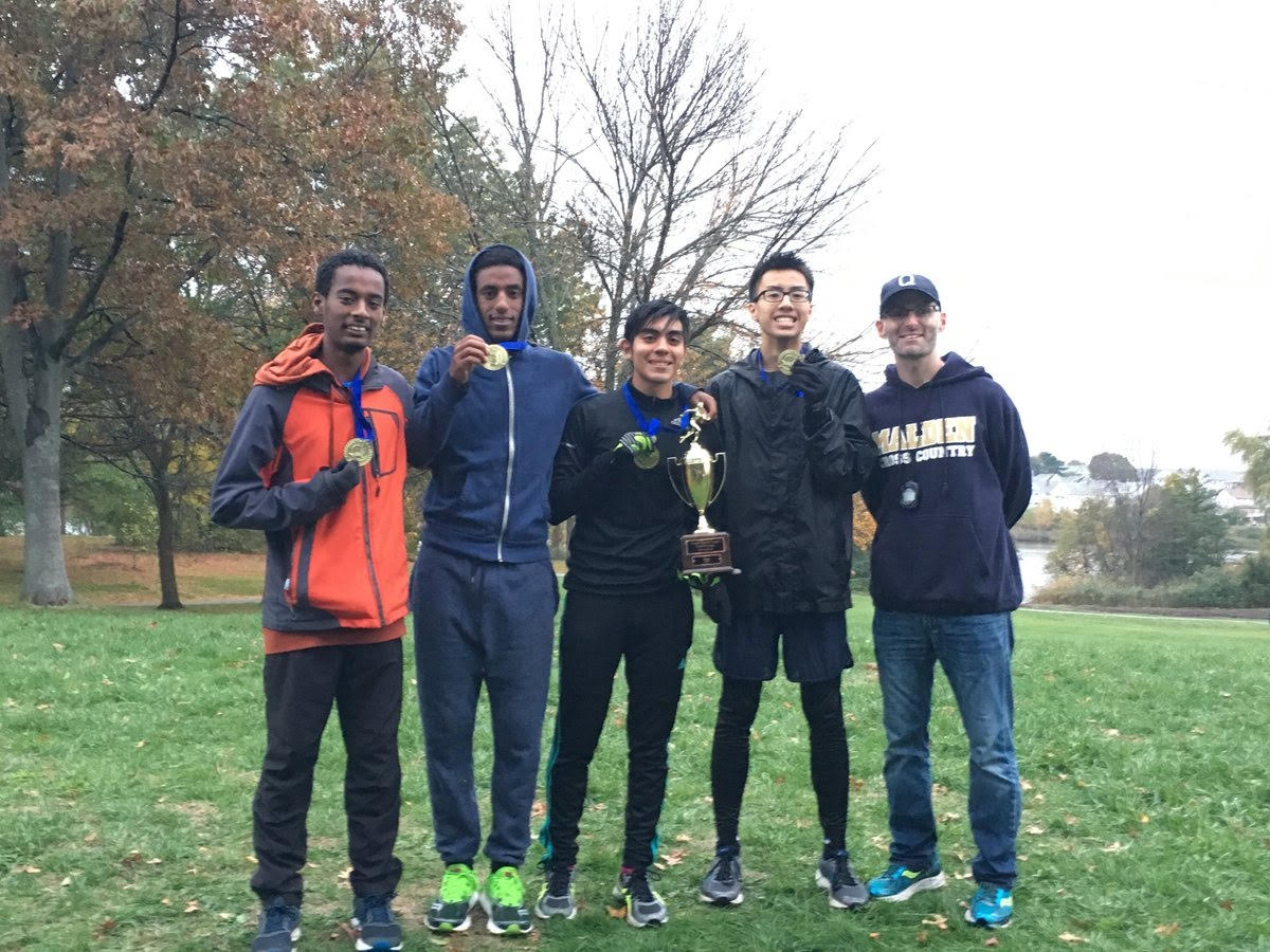  Ameen Anwar, far left, with his fellow teammates and coach David Londino. Photo submitted by Ameen Anwar. 