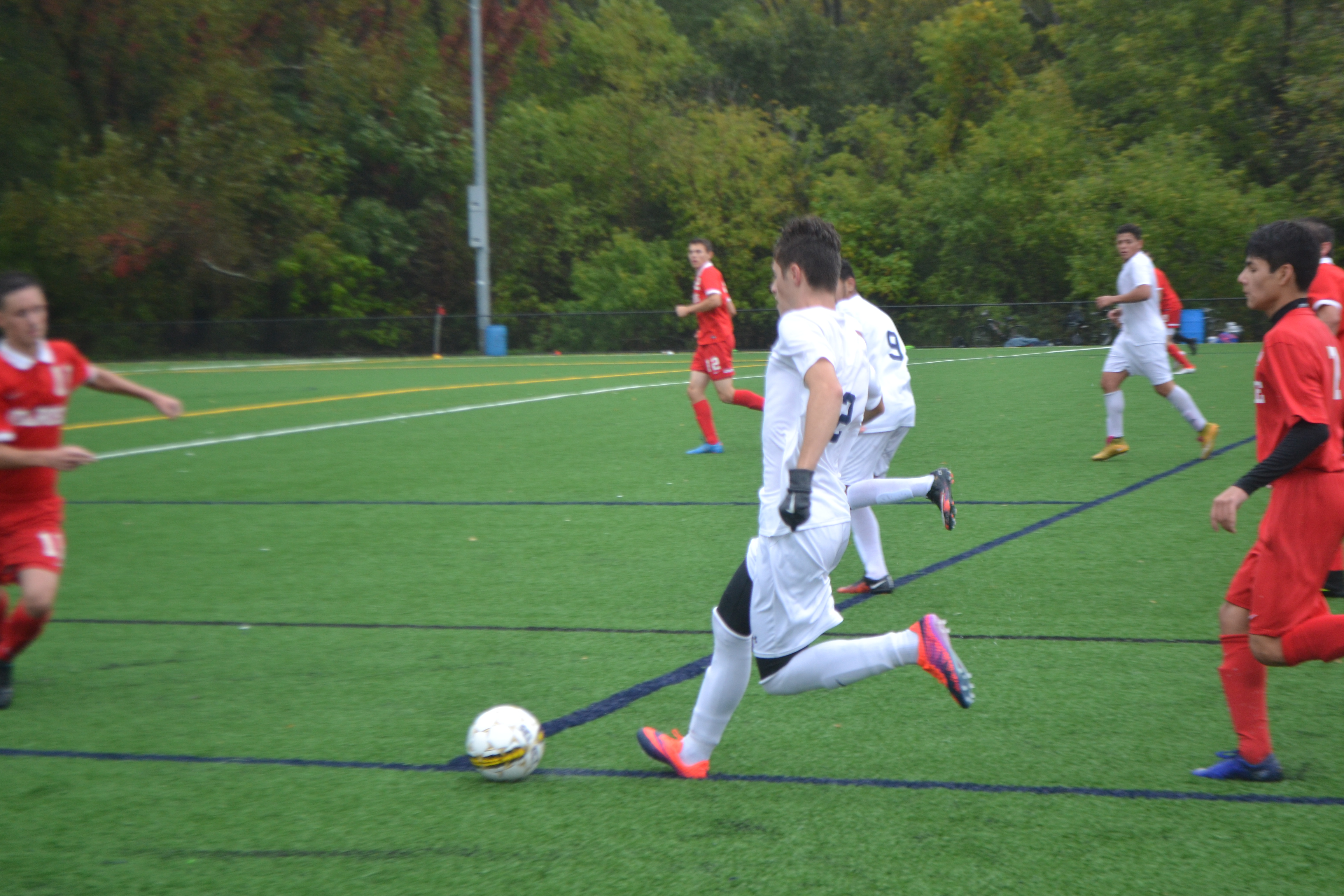 Sophomore Douglas Oliveira Do Nascimento running after the ball. Photo taken by Abhishek Rana. 