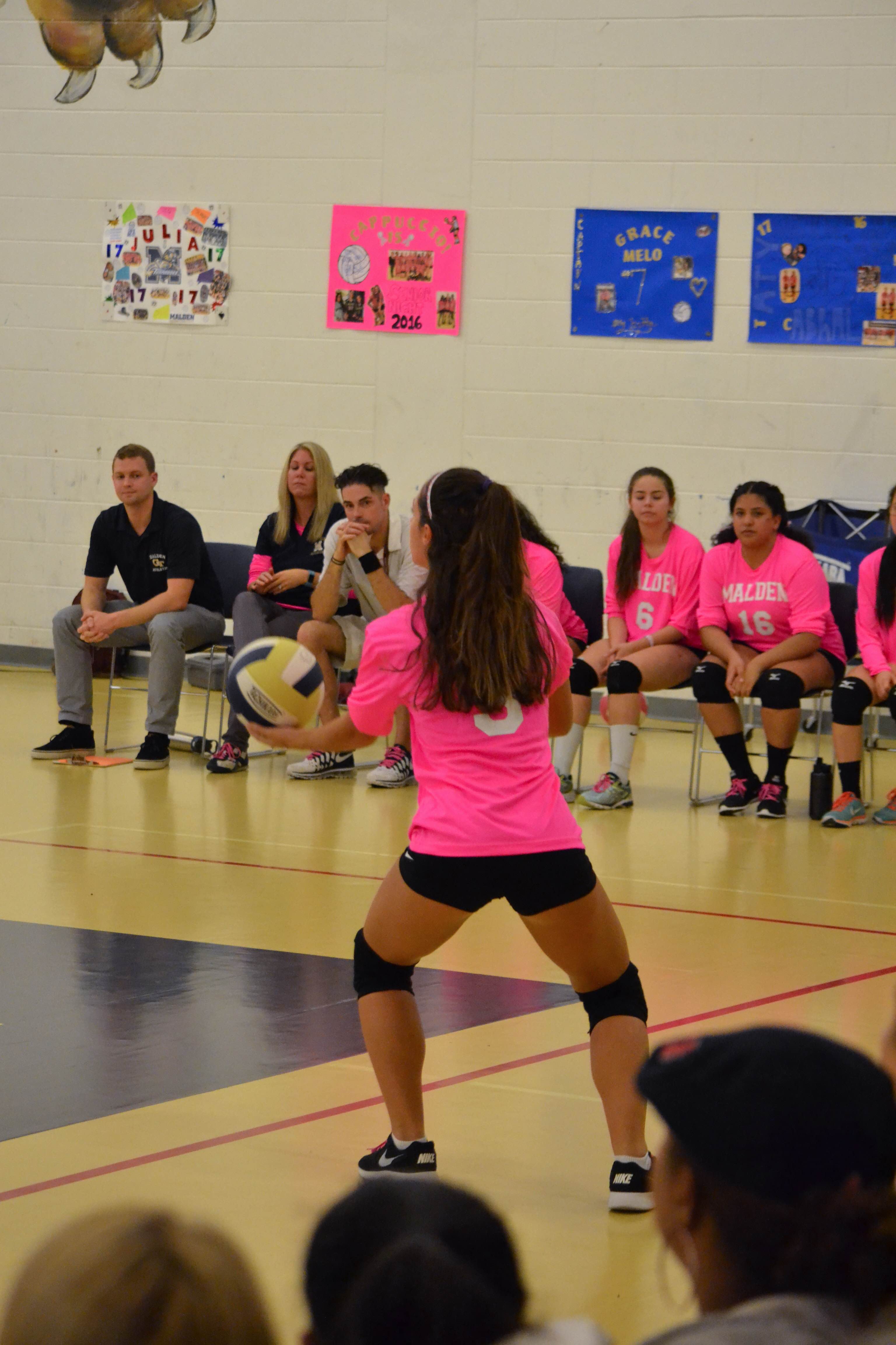 Senior Reanna Pinheiro getting ready to serve. Photo submitted by Daisy Depina. 