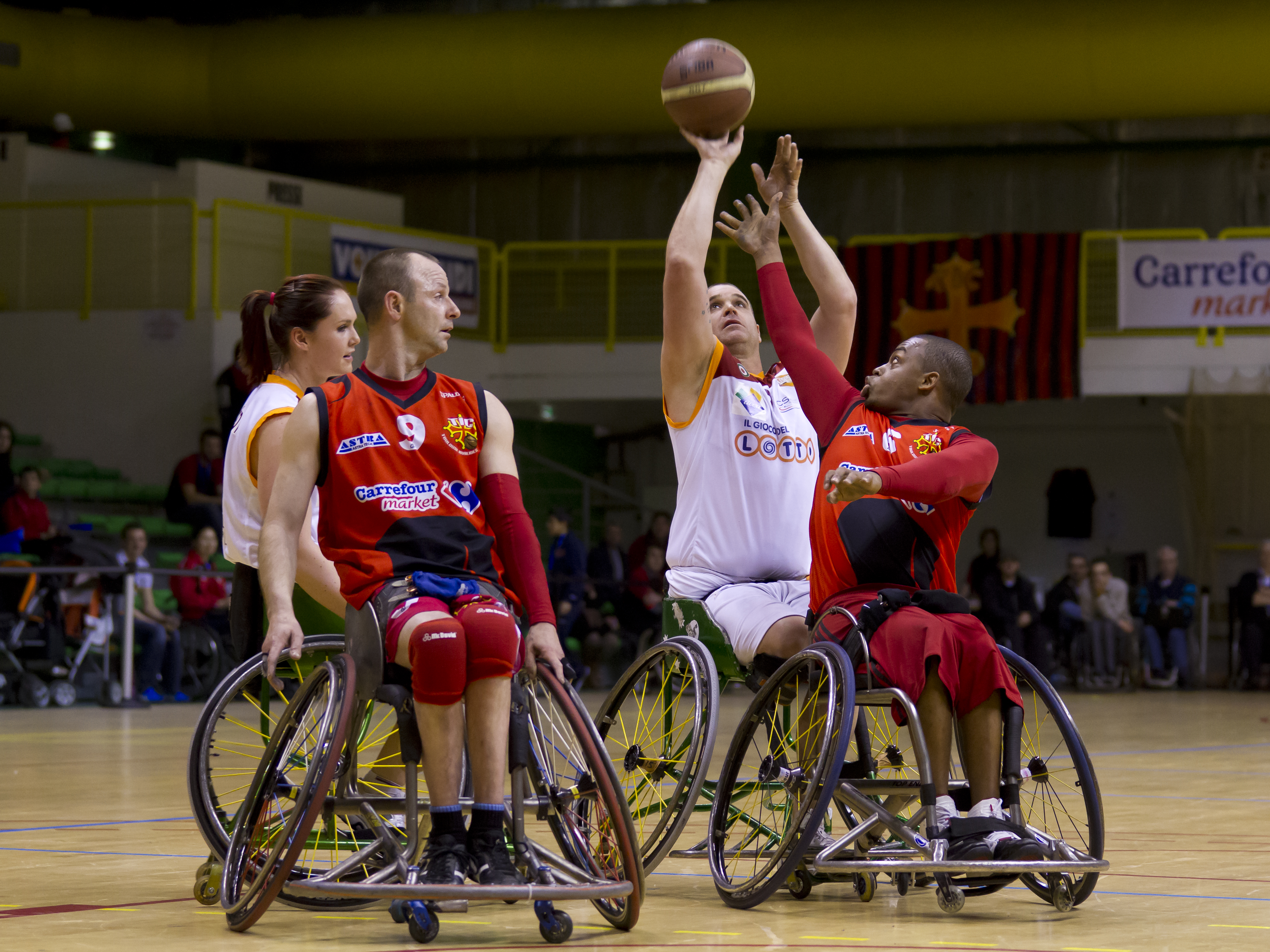 A game of wheelchair basketball. Photo from WikiMedia.