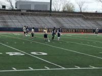 Malden and Winthrop players watching and getting ready.