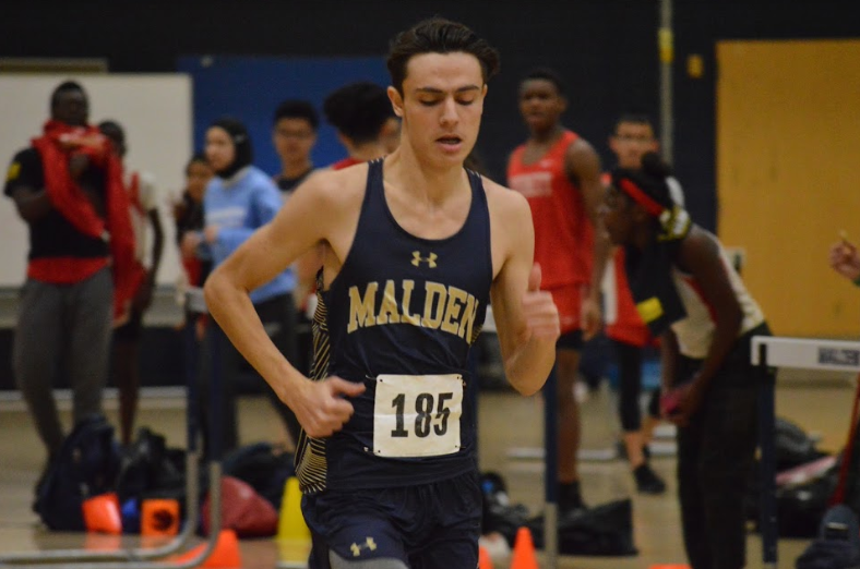 Junior Brendan Santos running. Photo by David Cartledge