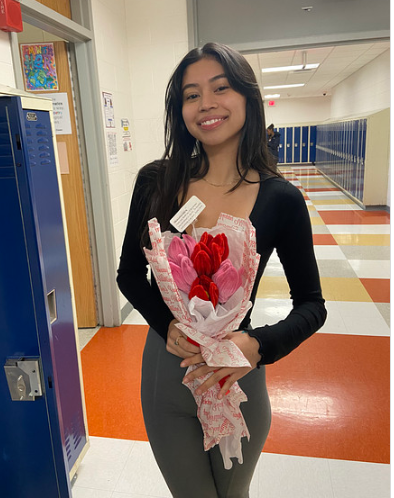 Students who purchased the pipe cleaners flowers after they were distributed. Photos submitted by Gabriela Parini Cordova