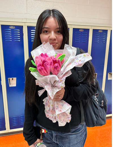 Students who purchased the pipe cleaners flowers after they were distributed. Photos submitted by Gabriela Parini Cordova