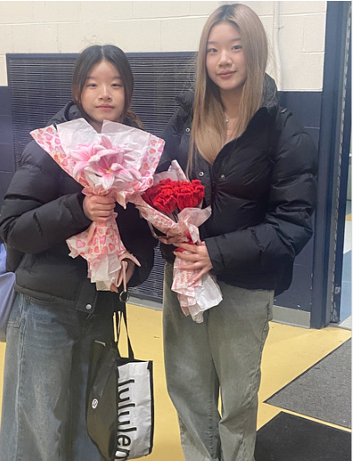 Students who purchased the pipe cleaners flowers after they were distributed. Photos submitted by Gabriela Parini Cordova