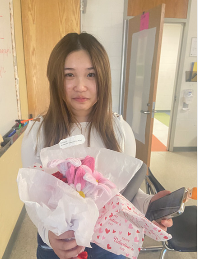 Students who purchased the pipe cleaners flowers after they were distributed. Photos submitted by Gabriela Parini Cordova