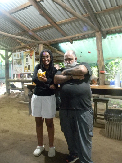 Reporter Haset Tesfaw poses with the chocolatier after a tour of the plantation. THOMAS TIERNEY